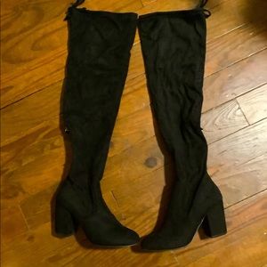 Black tall knee high boots